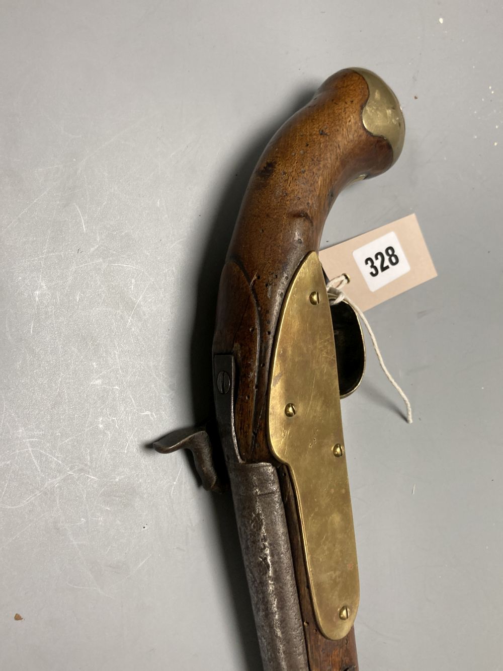 A 19th century percussion cap pistol (incomplete), length 39cm